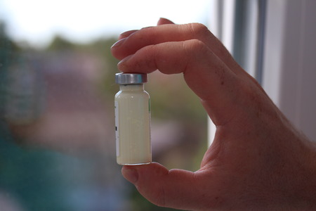 Male hands with the medicine powder.の写真素材