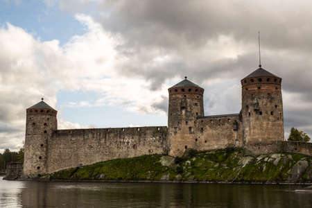 St. Olaf's Castle (Olavinlinna, Olofsborg) in Savonlinna which is situated on the South of Finland pictured in a cloudy dayのeditorial素材