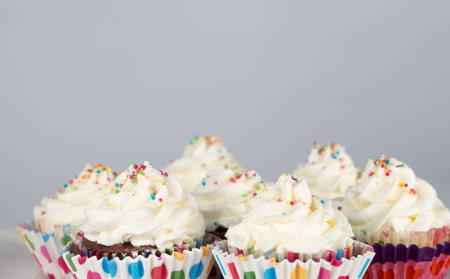 Row of birthday cupcakesの写真素材