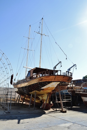 Building a boat in a harbour of Kemerの写真素材
