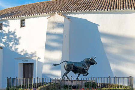 Monument to the bull that stands in front of the Ronda bullring, Malaga, Andalusia, Spainの写真素材