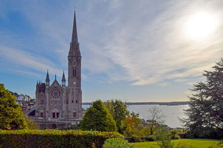 Saint Colman Cathedral with cork harbor next to it, Cobh, Irelandの写真素材