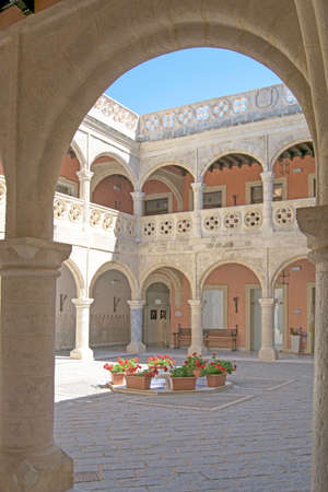 Patio of the Castillo de Luna in Rota through an ancient mudejar arch, Cadiz province, Andalusia, Spainのeditorial素材