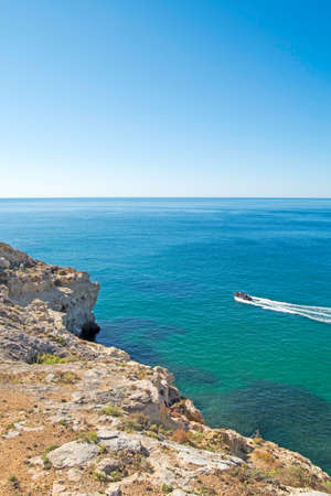 Algarve coast. Rock formations in Ocean Atlantic in Carvoeiro, Lagoa, Portugalの写真素材