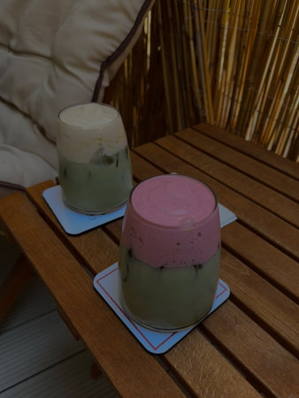 Photo of glasses with matcha teaの写真素材