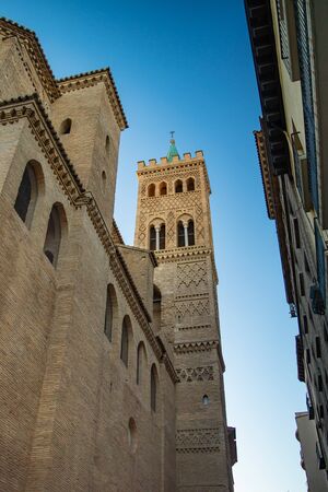 View of the Mudejar tower of the church of San Gil on Calle Don Jaime in Saragossa, Spainの写真素材