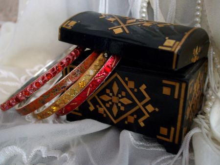 Black laquered box with bangle bracelets