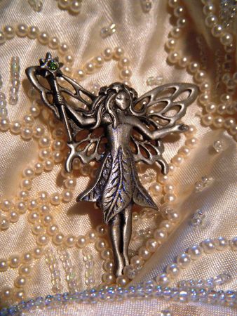Fairy pin on beaded satinの写真素材