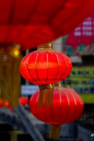 Red chinese lanterns in the streat during the chinese new year in Myanmarの写真素材