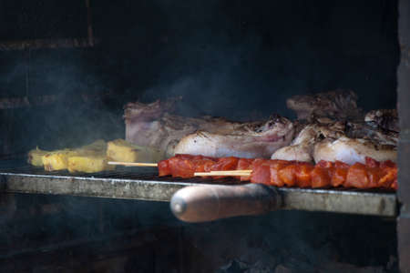 Delicious assorted meat barbacue: pork, chicken and beef on the grill