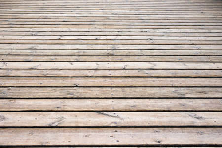 Walking path with old wood strips. Texture and backgroundの写真素材