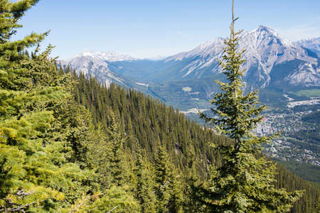 Beautiful aerial view of Rocky Mountains and Banff on a sunny day. Albertaの写真素材