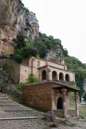 Ancient church of Santa Maria de la Hoz sorrounded by nature at Tobas, near Frias, Merindades, Burgos, Spain, Europeの写真素材