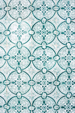 Old portuguese tiles with pattern in white and green colors. Background. Portugal, Europe