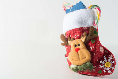 Christmas sock full of presents and candy canesの写真素材