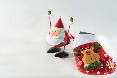Santa with a sock full of presents with white background