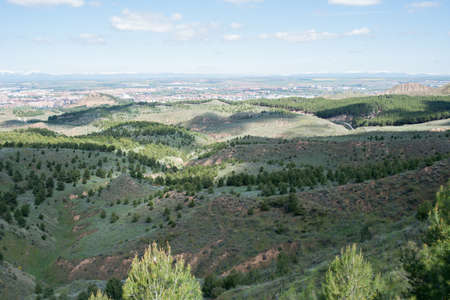 Beautiful view of Cerros Park, a public park surrounding Alcala de Henares. Snowed mountains in the background. Madrid. Spainの写真素材