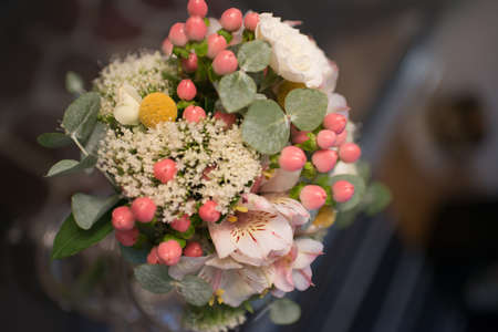 Elegant wedding bouquet with pink and white flowers. Interiorの写真素材