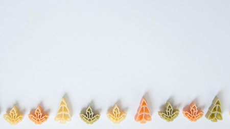 Pattern with raw pasta trees and leaves. Three colorsの写真素材