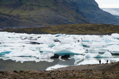 Jokursarlon glacier front with unrecognizable tourists. Icelandの写真素材