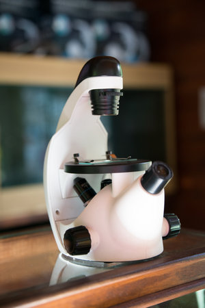 Classic scientist microscope. Laboratory equipment concept. Spain