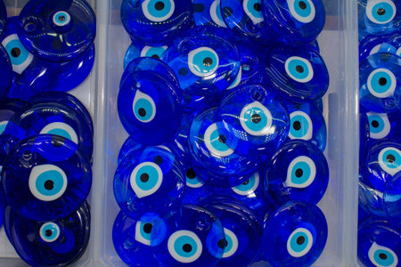 Souvenir for tourists. Pile of turkish evil eye nazar (amulet). Made of glassの写真素材