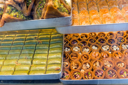 Delicious turkish pastries with nuts and honey. Market in Istanbulの写真素材