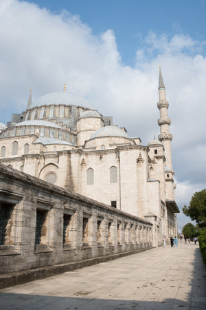 Facade of Suleymaniye Mosque, Istanbul,Turkey. No people, blue sky with come clouds.の写真素材
