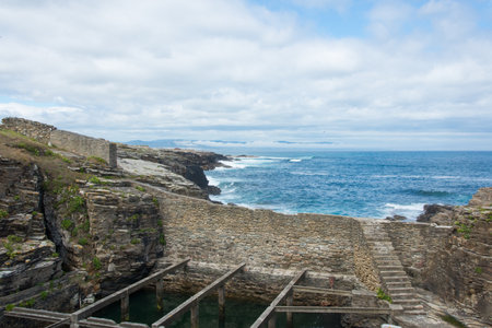 Old seafood farm at Rinlo, Galicia, Spain. Rinlo is close to Ribadeo, it is a picturesque medieval coastal village with a natural harbor.の写真素材