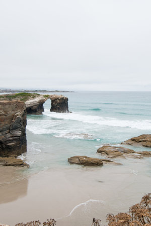 Beautiful aerial view of Cathedrals beach, a natural touristic landmark in Galizia. No people. Lugo, Galizia, Spainの写真素材