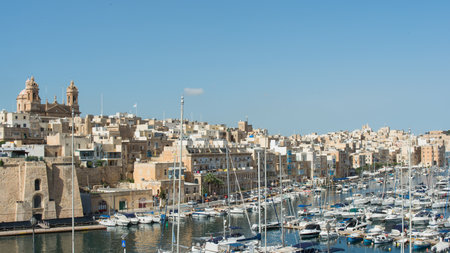 Panoramic view of Valleta harbour Marsamxett and cityscape. Sunny day. Valletta has two natural harbours, Marsamxett and Grand Harbor.の写真素材
