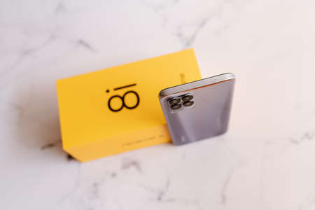 Adra, Spain; April 10, 2022: Realme 8i smartphone in violet color of the Chinese brand.のeditorial素材
