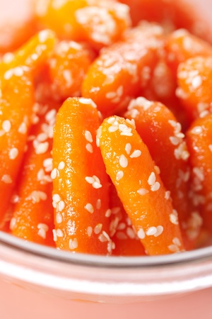 Honey glazed baby carrots with sesame seedsの写真素材
