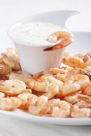 Fried shrimps on a plate and sauceの写真素材