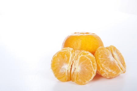 Ripe tangerines on white background. の写真素材