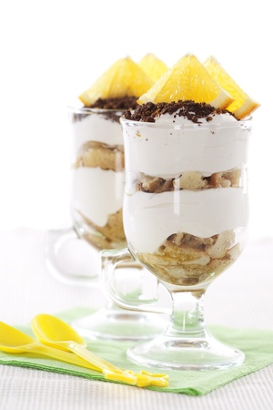 Tasty tiramisu dessert in two glassesの写真素材