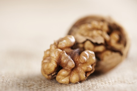 Walnuts close-up on the sackcloth background の写真素材