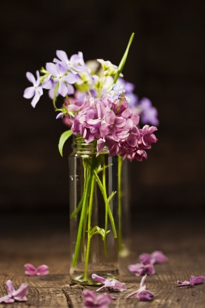 Bouquet of spring flowers on wooden backgroundの写真素材