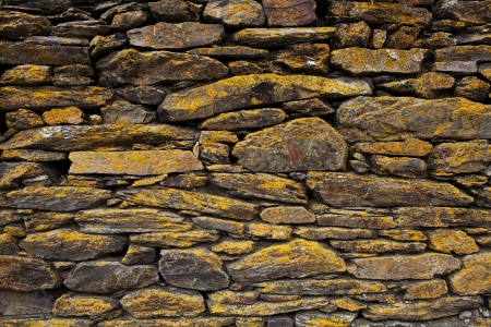 Background of old stone wall textureの写真素材