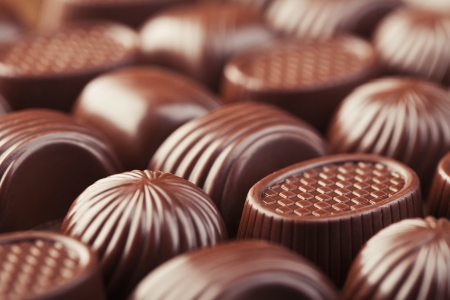 Assorted delicious chocolate pralines backgroundの写真素材