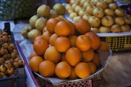 Fresh organic oranges at marketの写真素材