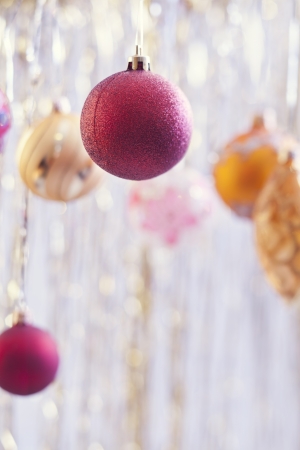 Ð¡hristmas balls hanging on silver backgroundの写真素材