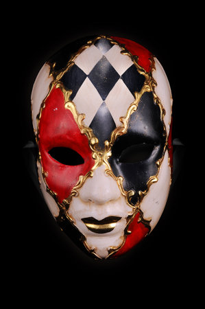 The traditional carnival mask on black background.の写真素材