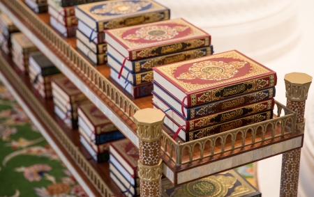holy Quran books on a shelf in a mosqueの写真素材