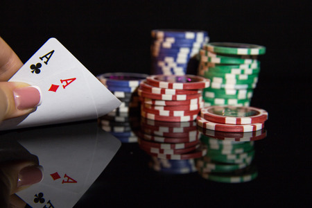 Multicolored casino chips for playing pokerの写真素材