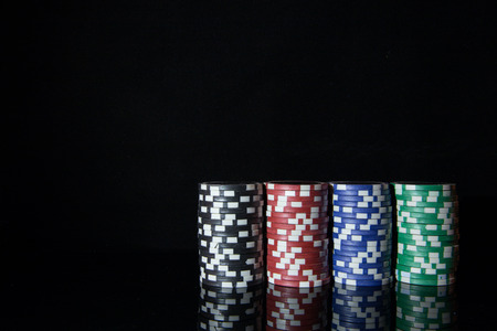 Multicolored casino chips for playing poker