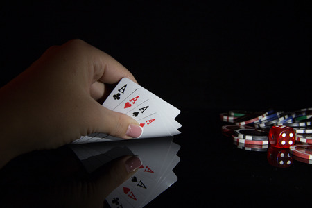 Multicolored casino chips for playing pokerの写真素材
