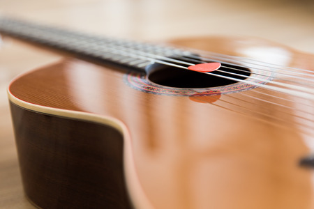 A classical guitar with six nylon strings