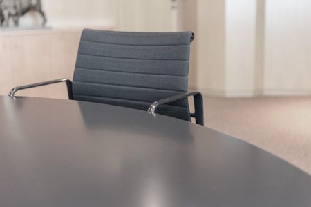 Table and armchair in a conference roomの写真素材