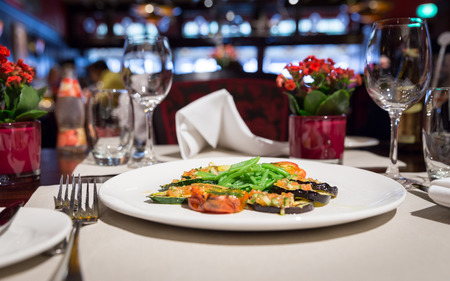 Fine table setting in a luxurious restaurantの写真素材